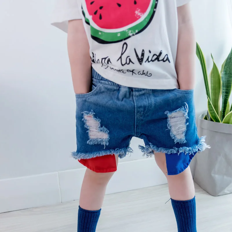 2018 рваные джинсы Шорты девушки версия летняя детская одежда личности прилив бахромой джинсовые шорты От 1 до 5 лет