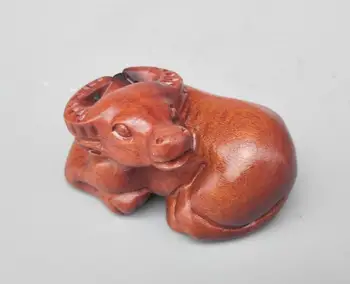 

China wood carving cow small statue