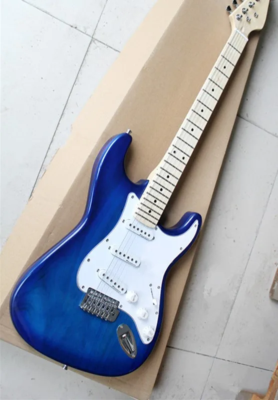 

Blue body electric guitar with SSS pickup, White Pickguard, chrome hardware, custom made, free delivery.