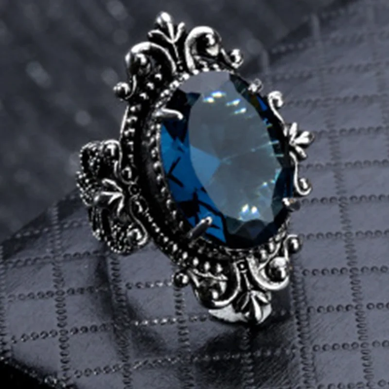 

New natural sea blue ring Europe and America retro Thai silver goose egg shaped hand jewelry woman ring