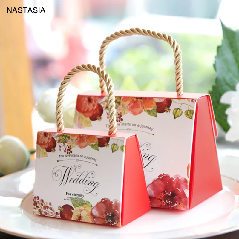 

10pcs/lot Wedding gift bag creative European wedding hand candy bag wedding companion hand gift gift box carton.