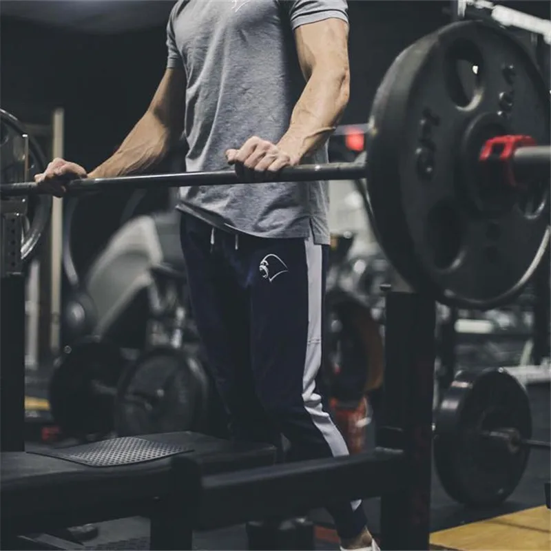 Sport Pantaloni dell'abito degli uomini Corsa e Jogging Pista Pantaloni Abbigliamento Fitness Palestra Leggings di Cotone Pantaloni Maschio mma Pugile Formazione pantaloni della Tuta Uomini