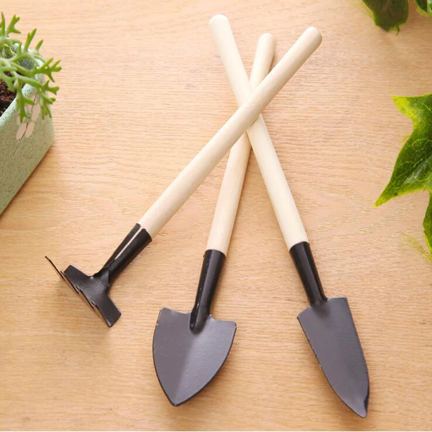 

Hot Selling 3PC/set Mini Garden Hand Tool Kit Plant Gardening Shovel Spade Rake with Wood Handle Metal Head for Gardener