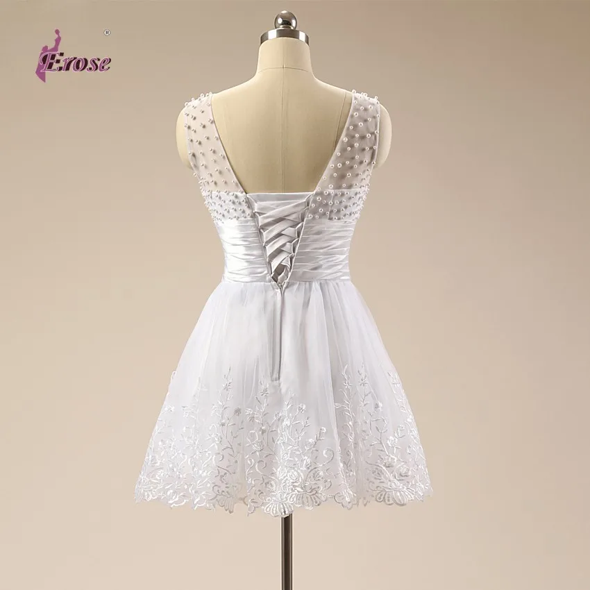 Abito da cocktail in pizzo bianco puro