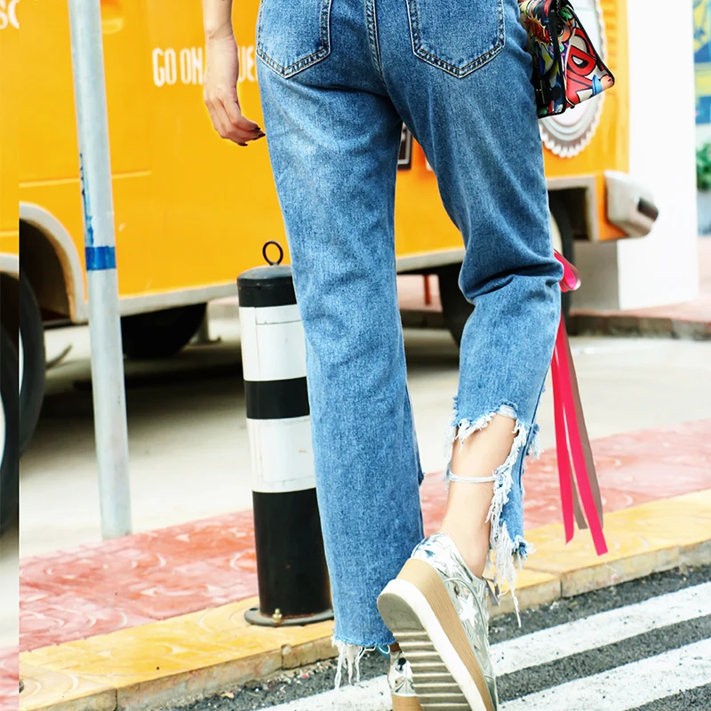 Тайская волна бренд личности нерегулярные отверстие джинсы свободные повседневные выдалбливают крест ремень повязки брюки для женщин