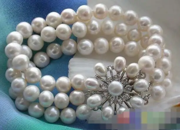 

3766 3ROW WHITE ROUND FRESHWATER PEARL BRACELET