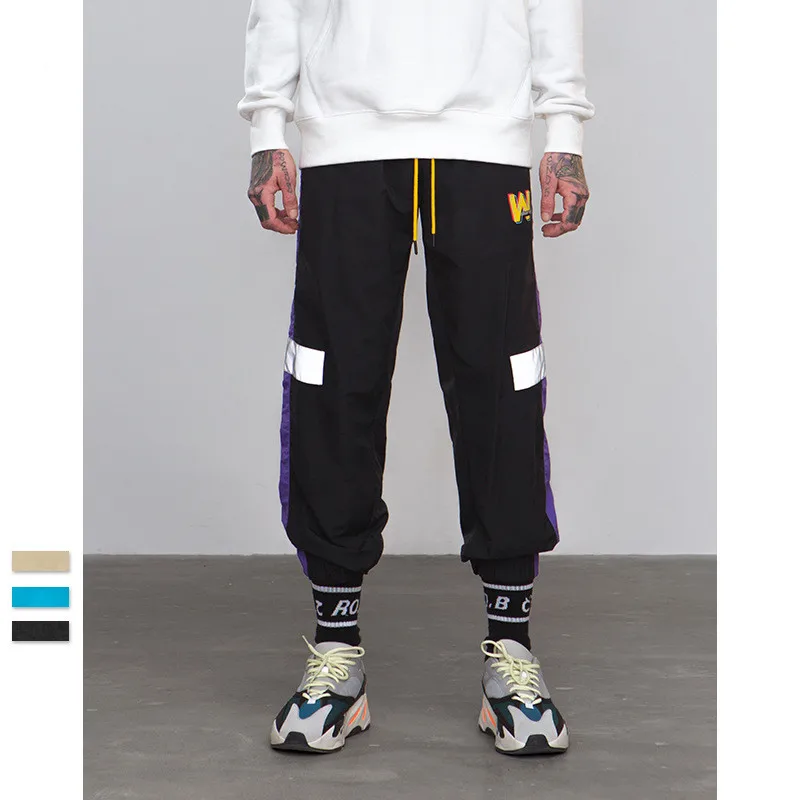 

2019 SS Reflect Light Tape Jogger Pants High Street Elastic Waist Sportswear Sweatpants Fashion Drawstring Side Pocket Trousers