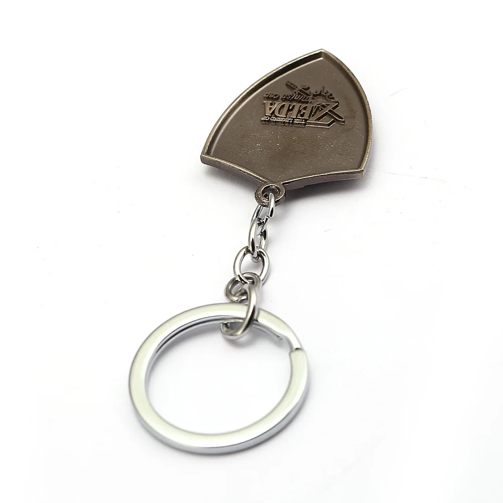 J Store juego clásico La leyenda de Zelda Llavero hombres metal shield colgante juego souvenir sleutelhanger llaveros