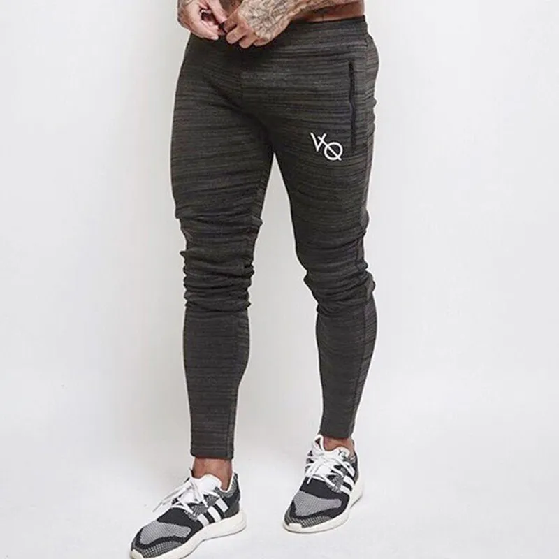 Высокое качество брендовая одежда Jogger Брюки Для мужчин тренажерные залы фитнес, бодибилдинг, тренировка брюки для бегунов осень брюки
