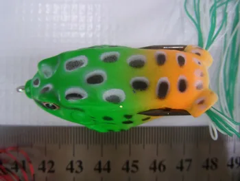 

Albacore soft fake frog with hook in its body for fishing water surface ferocious fish in grass water areas