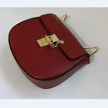 

French NO LOGO new womem Messenger bag and metal lock chain semicircle bag