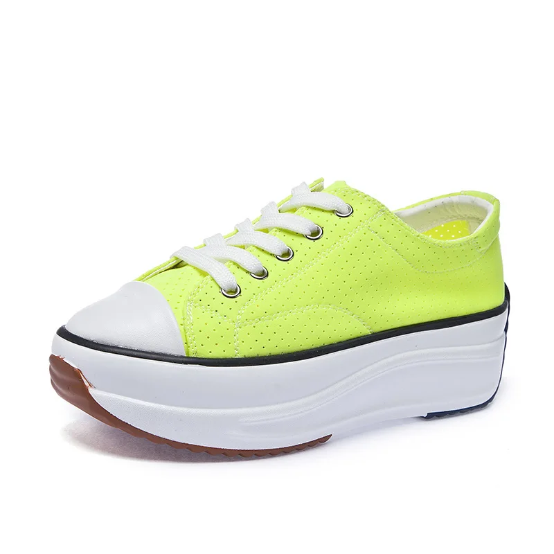 neon green and black sneakers