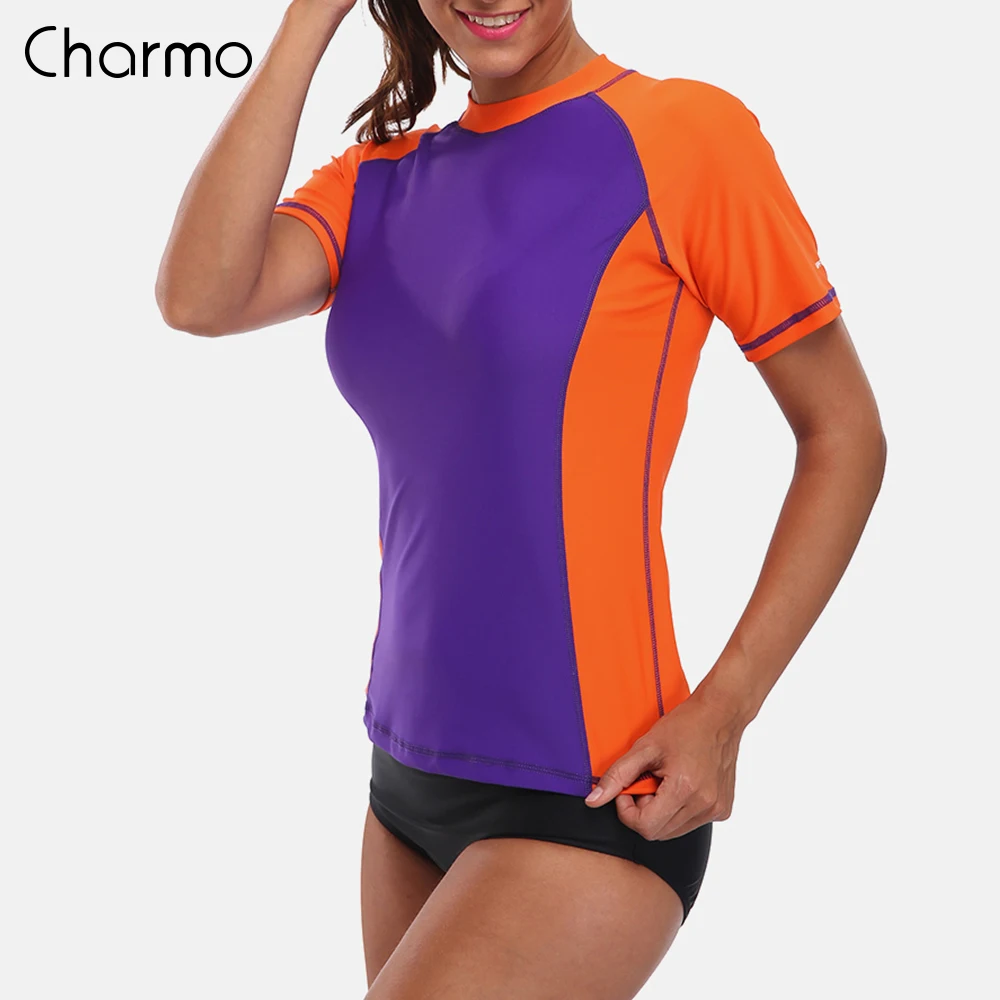 Charmo النساء قصيرة الأكمام طفح الحرس قمصان Rashguard ملابس تصفح أعلى UPF 50 + تشغيل قميص ركوب الدراجات قميص ملابس السباحة بدلة ركوب الأمواج