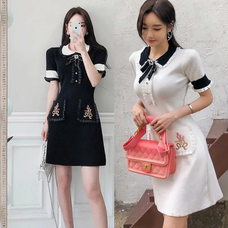 Baratos 2019 verano nuevo temperamento coreano dulce muñeca cuello arco delgado vestido de punto Casual moda sexy bordado vestido de costura