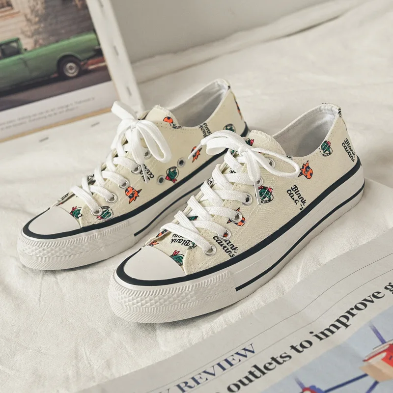 

2019 spring canvas shoes female students Korean version ins shoes street shooting wild chic graffiti small white shoes tide