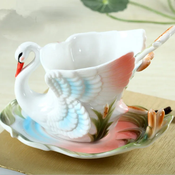 

1 Pcs Free shipping Swan Coffee Cup Colored enamel porcelain Cup with saucers and teaspoons of holiday Get married creative gift