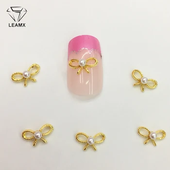 

LEAMX 10 PCS/bag Pearl Bow Nail Decoration 3D Hollow Bow Tie Nails Art Charm Alloy Nails Charms For Manicure Decoration L378