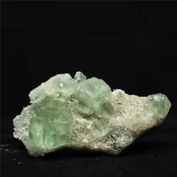 

Toys cat transparent fluorite ore fluorescent green natural fluorite lens is good teaching new mineral specimens
