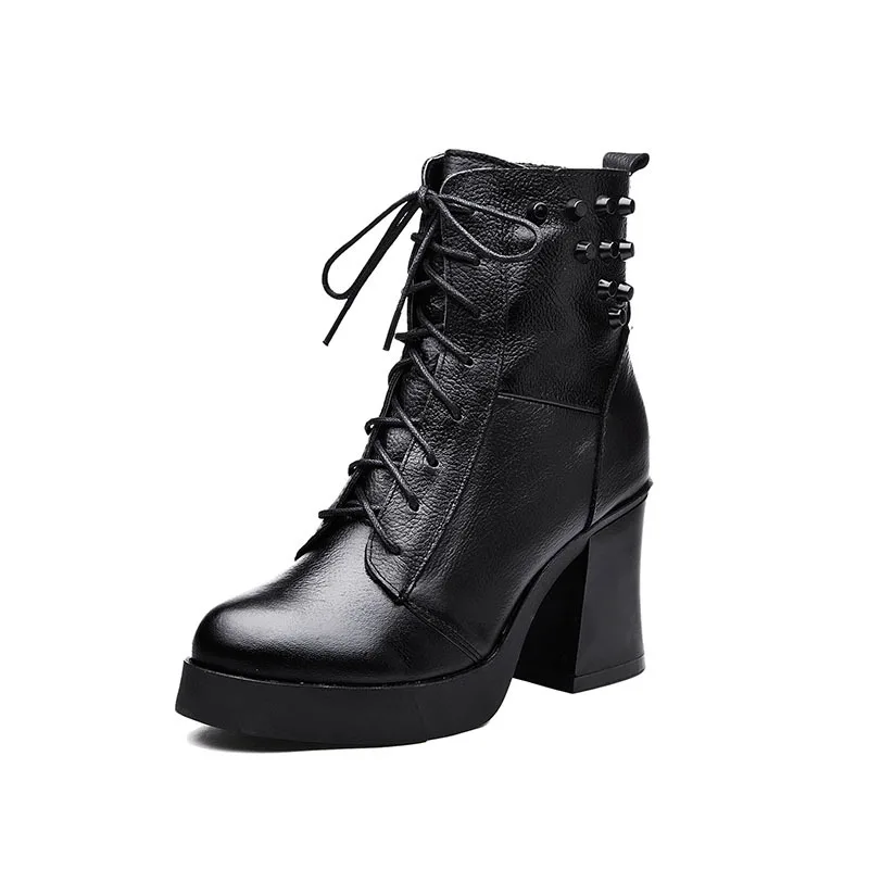 

2017 autumn and winter new leather Martin boots female high heel with a waterproof table rivets fashion in the tube female boot