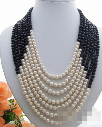 

Jew3111 7Strds White Pearl&Onyx Necklace