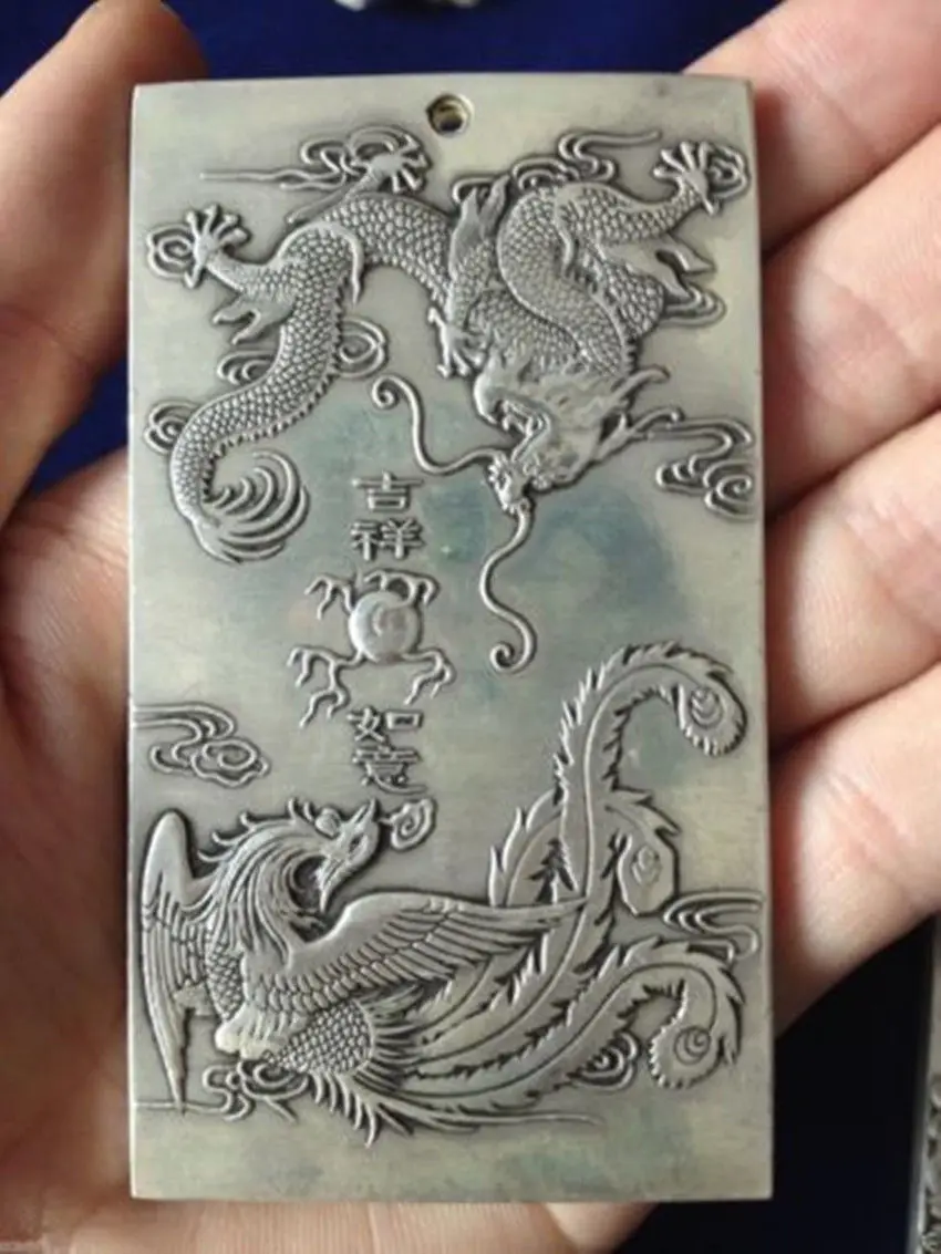 

Elaborate Chinese Tibetan silver dragon phoenix statue amulet auspicious plate