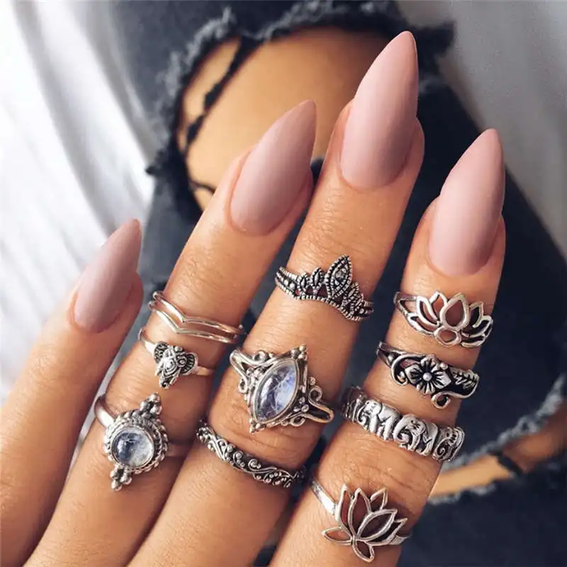 

Exaggerated hollow cut retro big gem lotus shape combined rings twist palm crown joint combination of 10 pieces