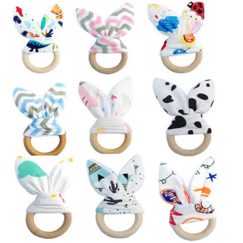 

Fashion Baby Bunny Ear Teether Wooden Teething Ring Toy Baby Teething Nursing Tools Multiple Styles Printing Teethers Chew Toy