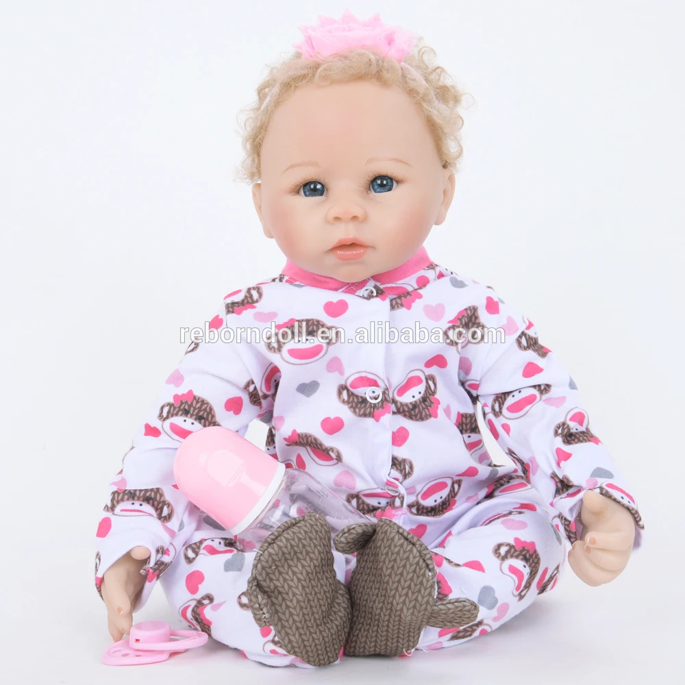 muñeco bebe ojos grandes