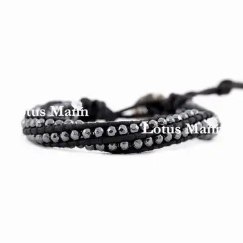 

Lotus mann Hematite Single Wrap Bracelet on Twisted Natural Black Leather