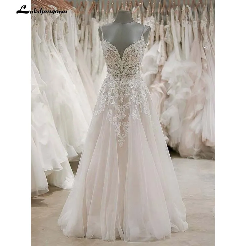 

Spaghetti Strap V Neck Beach Wedding Dresses Backless Ivory Tulle Wedding Dress Beach Wedding Dresses Vestido de Noiva