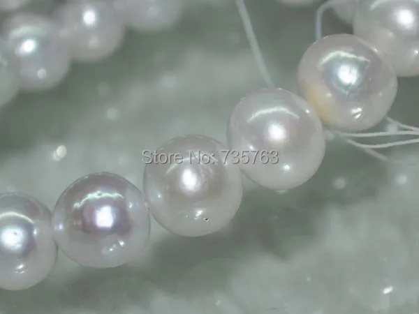 

xiuli 000405 Outstanding Natural Rare grey AA near round furrow nuclear pearl