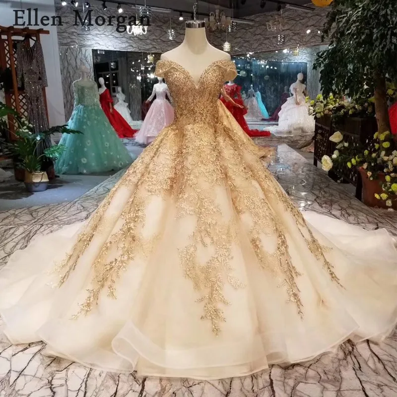 

Gold Ball Gowns Wedding Dresses 2019 Sexy Off Shoulder Lace up Beaded Corset Custom Made Real Photos Puffy Bridal Gowns