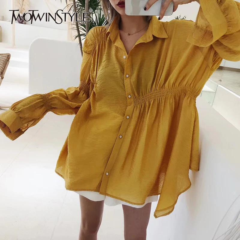 

TWOTWINSTYLE Women's Shirts Blouse Loose Puff Long Sleeve Single Breasted Asymmetric Hem Tops Female 2019 Fashion Korean Style