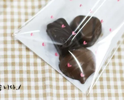 

100pcs mini heart printing cookie bag self adhesive seal cellophane bags for candy gifts soap packaging