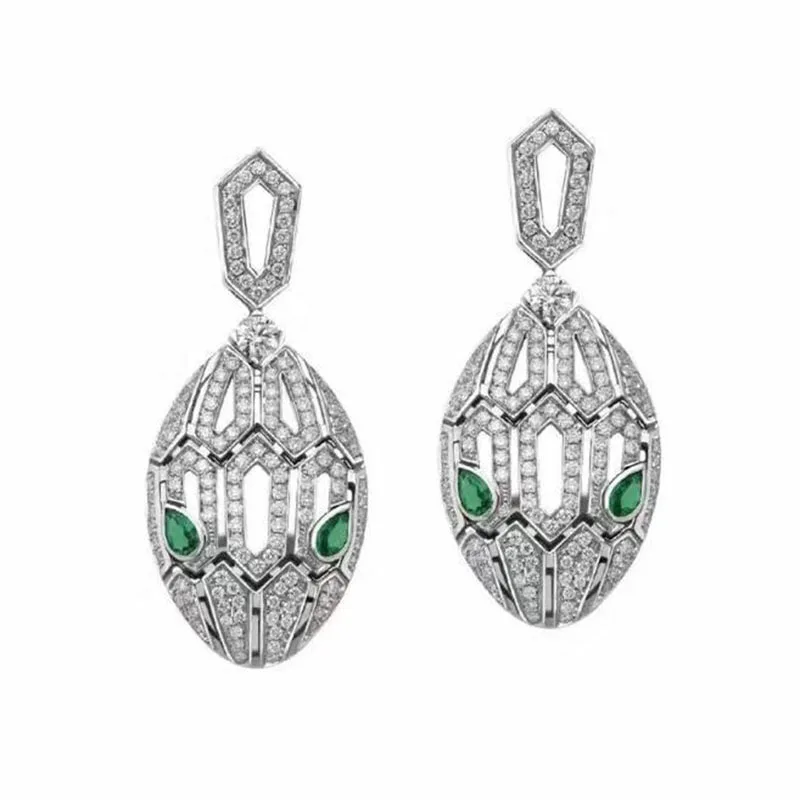

Qmarry Fashionable 925 Sterling Silver Greeneye Snake Hollow micro-inlaid crystal Earrings for Women Jewelry