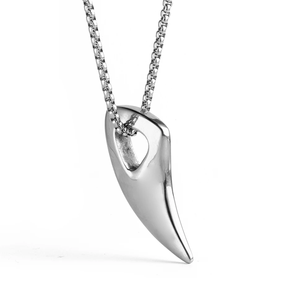 стальной клык. кулон клык. подвеска клык волка. клык из металла. стальной клык.