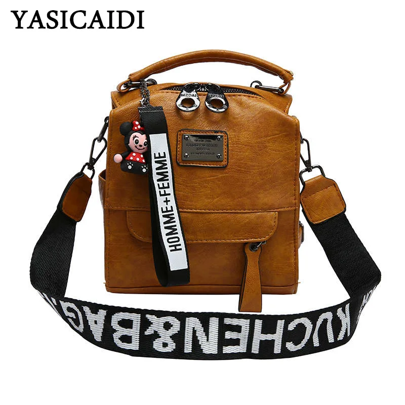 

YASICAIDI 2019 PU Leather Fashion Letter Printed Wide Shoulder Strap Handbags With Cartoon Pendant Homme Femme sac a dos femme