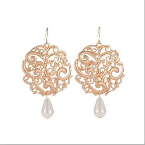 

e 1184 Exaggerated geometric carved water drops pearl earrings European and American retro palace national wind hollow round ear