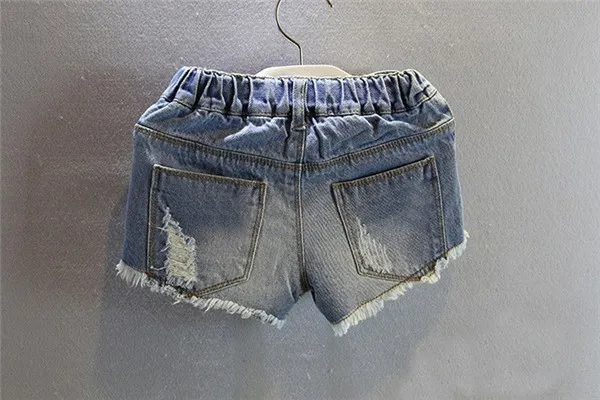 Летние шорты для девочек г. новинка джинсы для девочек популярный продаж детские повседневные штаны с дырками одежда для маленьких девочек размер на 2 до 7 лет