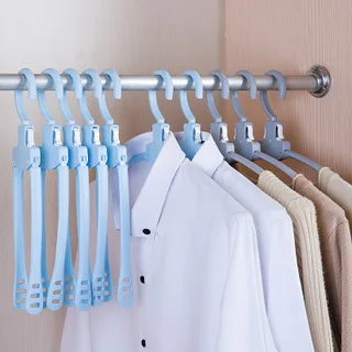 

Creative home multi-function magic clothes rack drying clothes hanger white plastic folding hanger