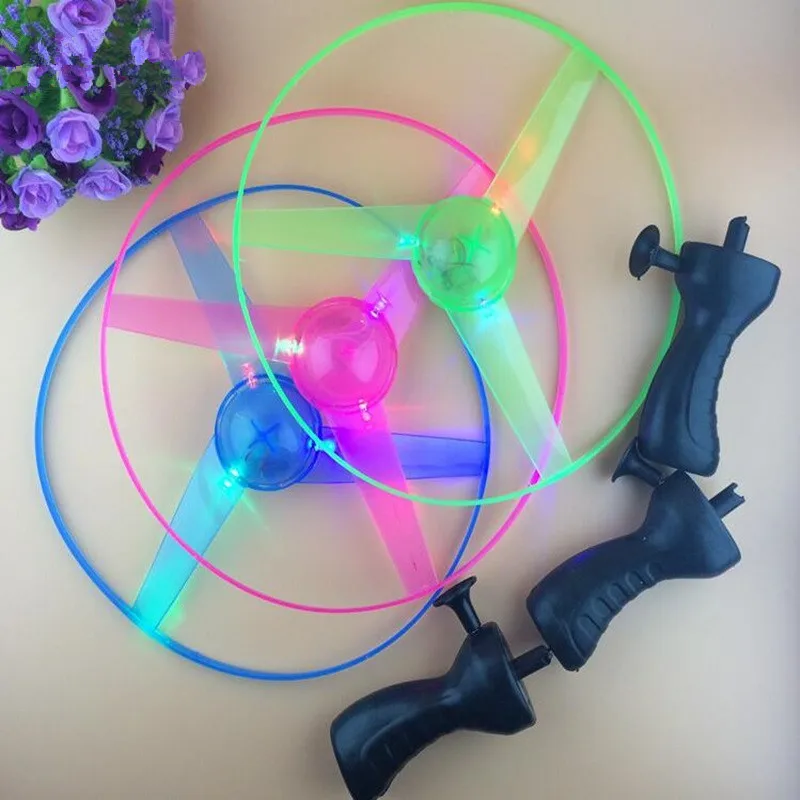 

Colorful Funny Toy Pull String Colorful LED Light Up Flying Saucer Disc Kids Toy As Children New Year Gift