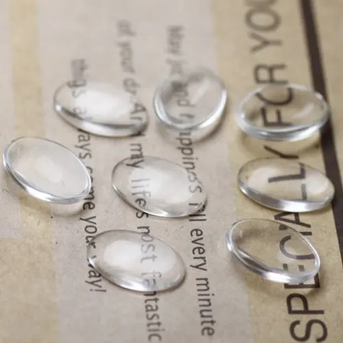 

Free shipping!!!!Free Shipping 500PCS Clear oval Glass Dome Cabochon Fit Cameo Settings10x14mm