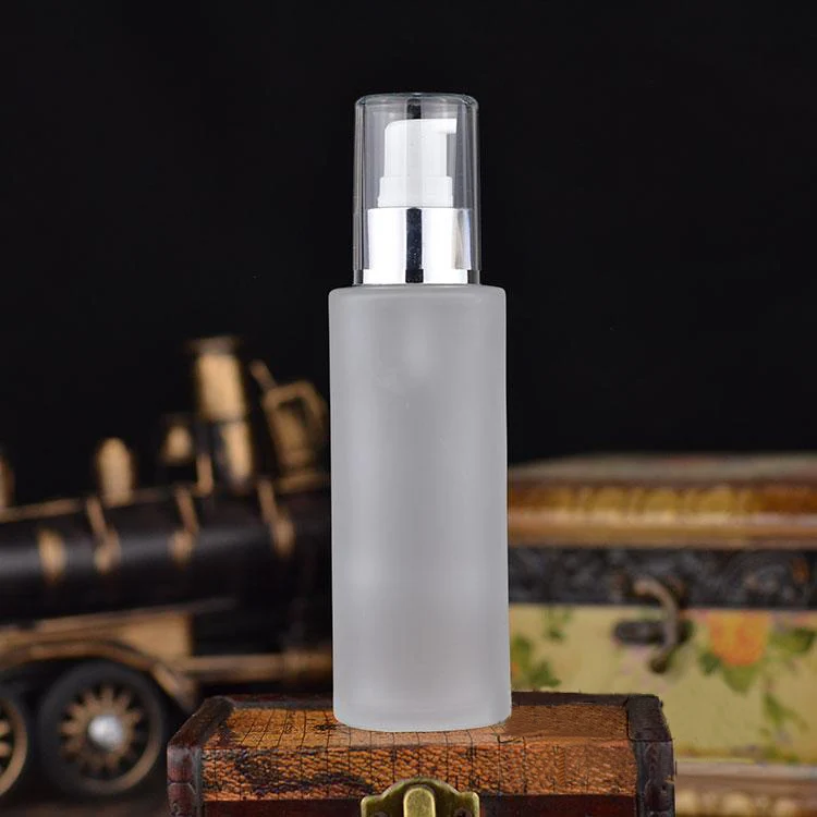100ml frosted glass bottle with shiny silver pump for lotion/emulsion