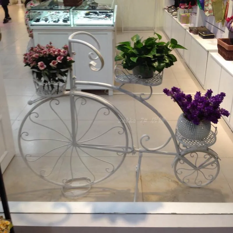 

zakka bicycle racks, wrought iron facade decorations