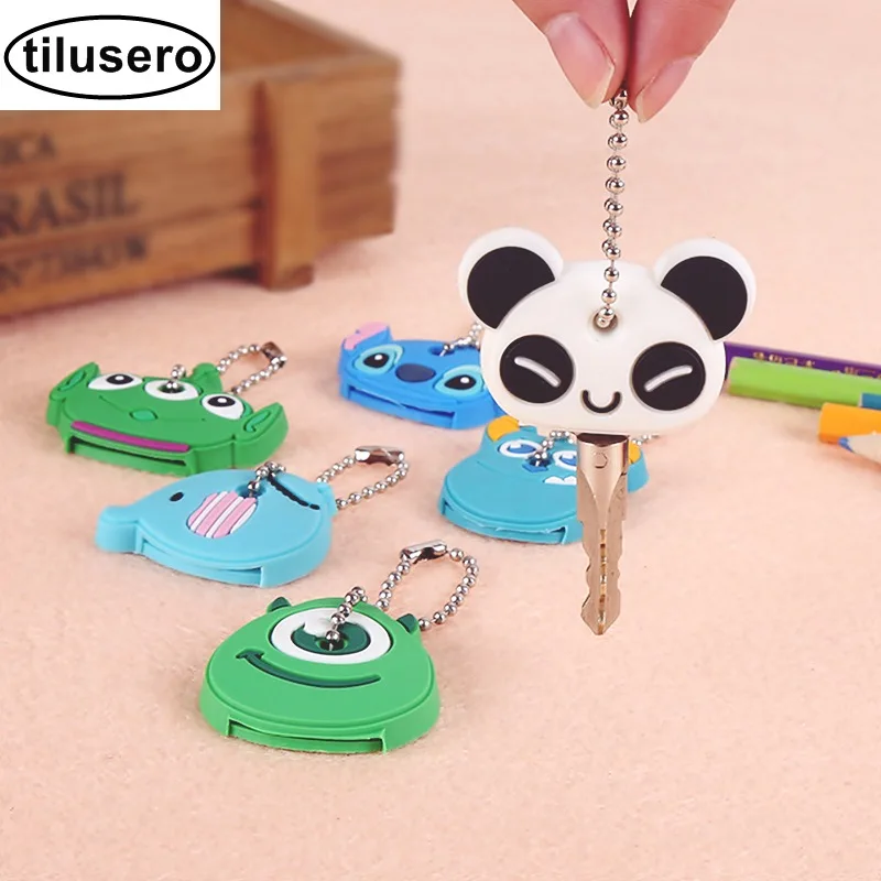 

8PCS/Lot Cute Anime Cartoon Silicone Stitch Minion Key Cover Key Caps With Keychain Key Holder F032