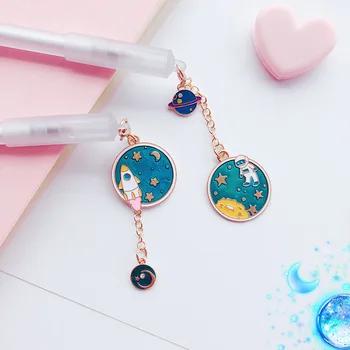 

24 pcs/Lot Space trip gel pen Galaxy planet pendant 0.5mm Black color pens writing kids gift Stationery school supplies A6610