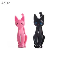 XZJJA 4Pcs/lot Creative Plastic Clothes Pegs Cute Cat Laundry Hanging Clothes Pins Beach Towel Clips Clamp Household Clothespins