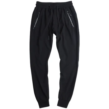 

2019 new Gain weight and increase size sportswear, men's loose leisure pants, causal spring and autumn men's guard trousers