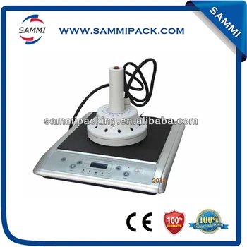 

Portable induction aluminum foil lid sealing machine
