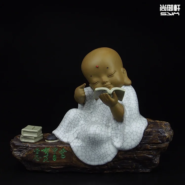 

Shiwan doll master of fine gold in the books a little monk who study Zen ceramic ornaments